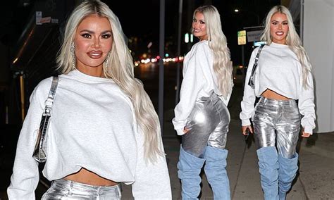 Chloe Sims stuns in silver metallic jeans and thigh high boots in LA